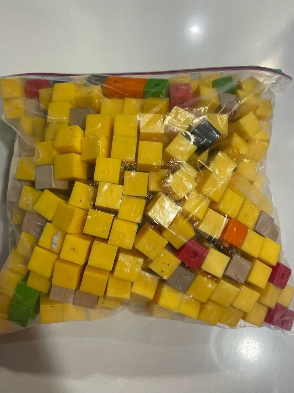 Bag of Yellow Wooden and Plastic Cubes with Assorted Accent Colors